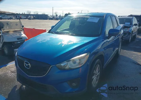 2013 Mazda Cx-5 Touring z USA, uszkodzony, nr VIN JM3KE2CE7D0165697